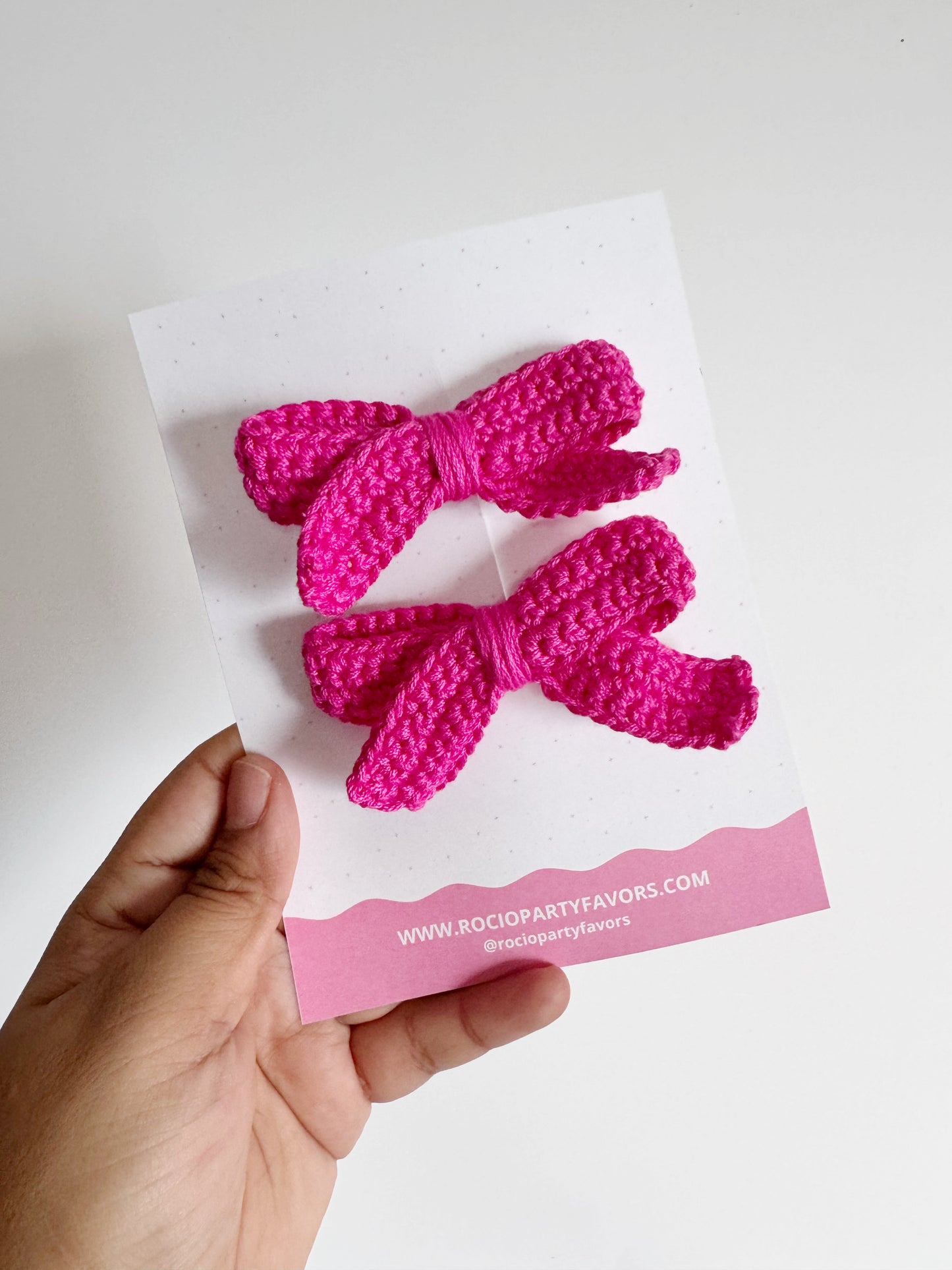 Skinny pigtail bow (en par)