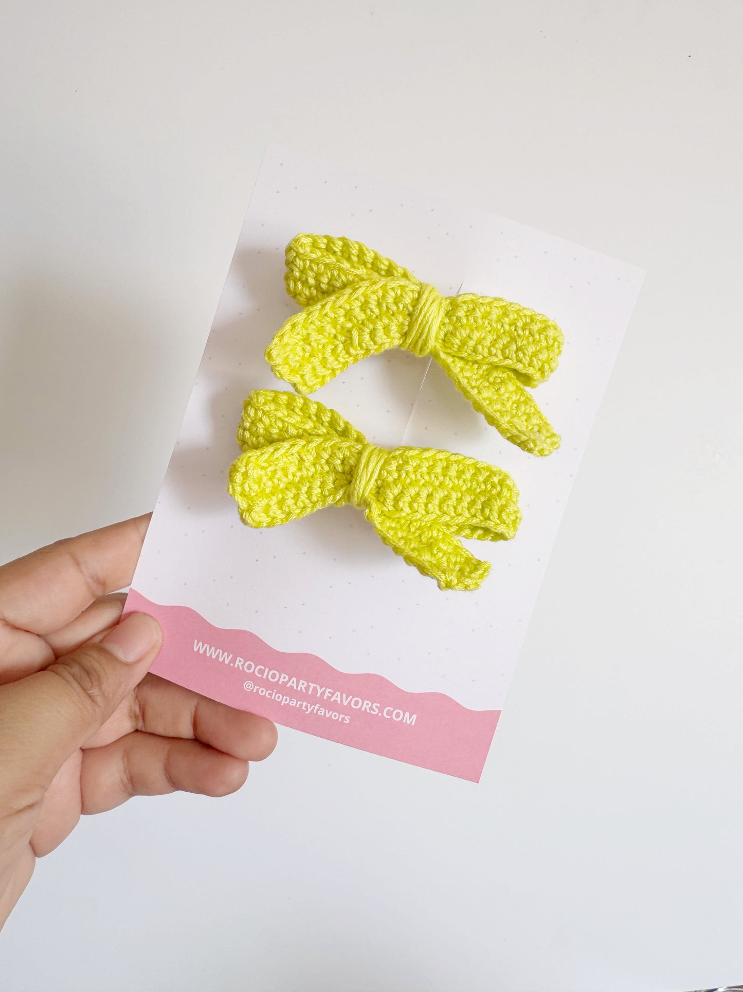 Skinny pigtail bow (en par)