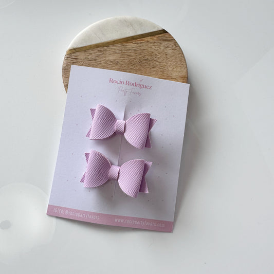 Par de mini moños en vinil